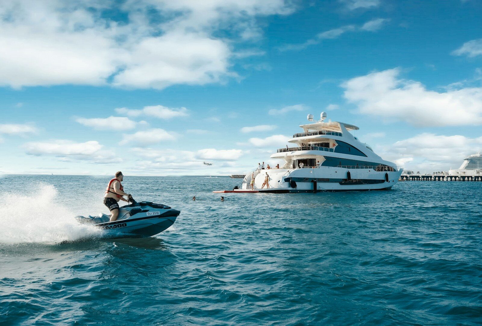 A man riding a jet ski on top of a body of water